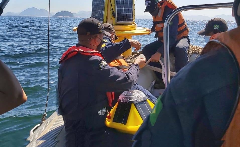 Brazilian Navy team deploying a Spotter buoy from a Zodiak boat